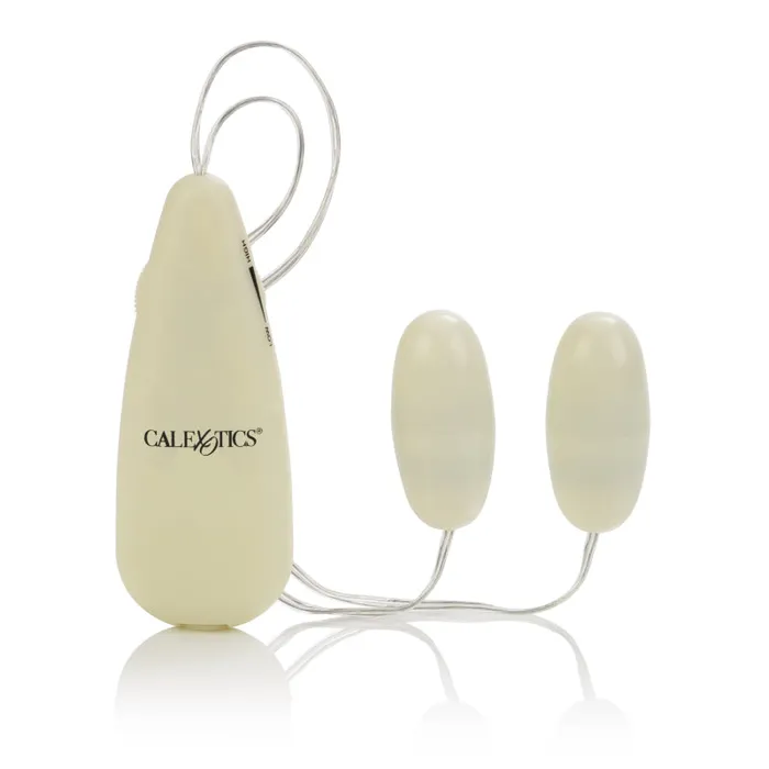 CalExotics Female Sex Toys GlowintheDark Pocket Exotics Vibrating Glowing Double Bullets CalExotics Female Sex Toys GlowintheDark Pocket Exotics Vibrating Glowing Double Bullets